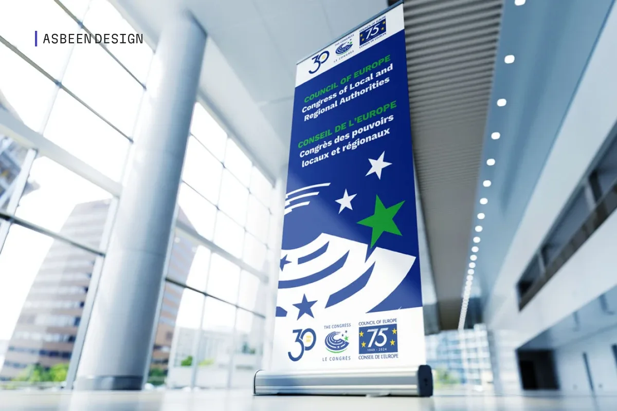 Roll-up du Congrès déployé dans un espace institutionnel